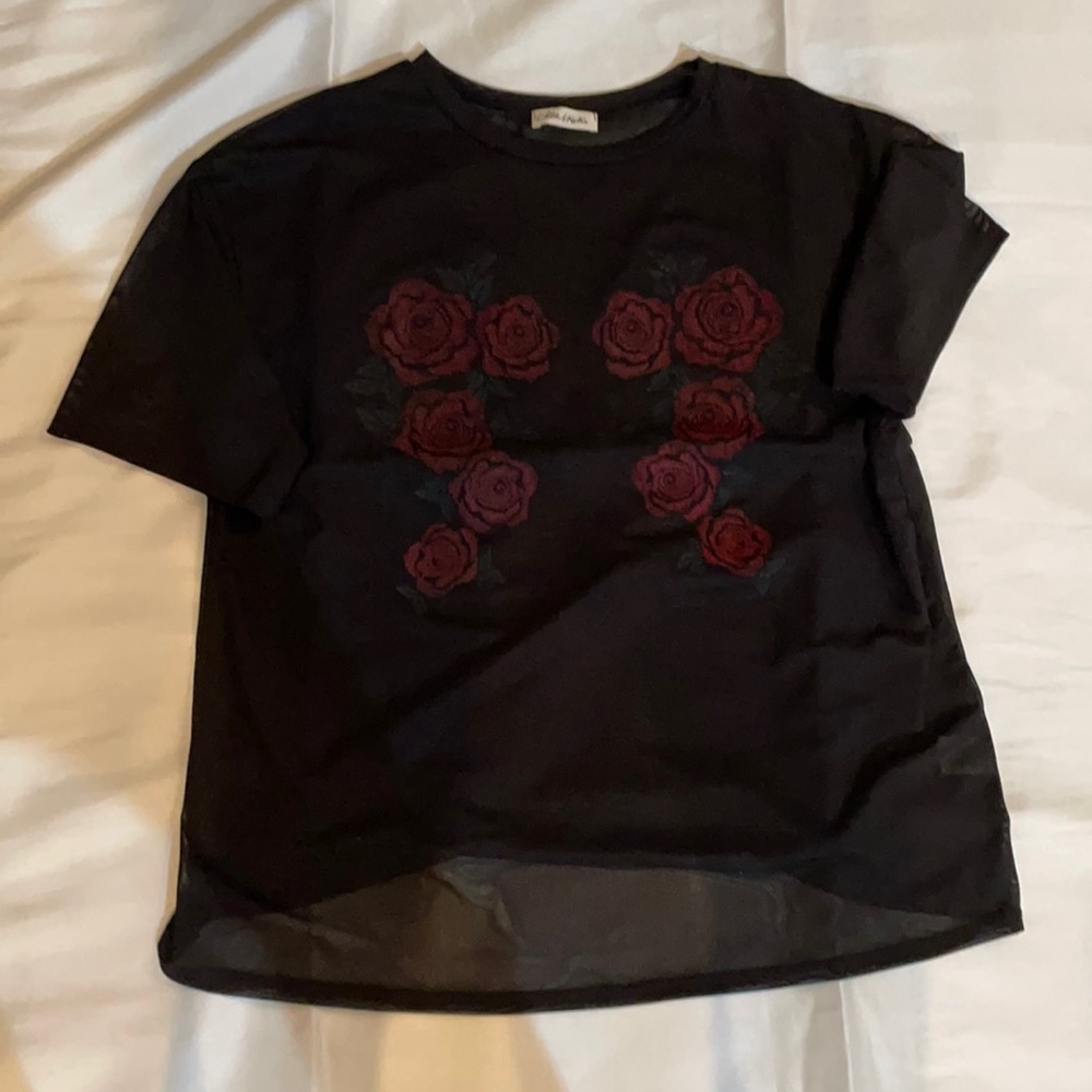 Black mesh featuring roses
